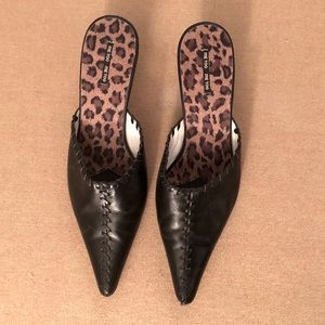 Me Too pointed toe backless heel.